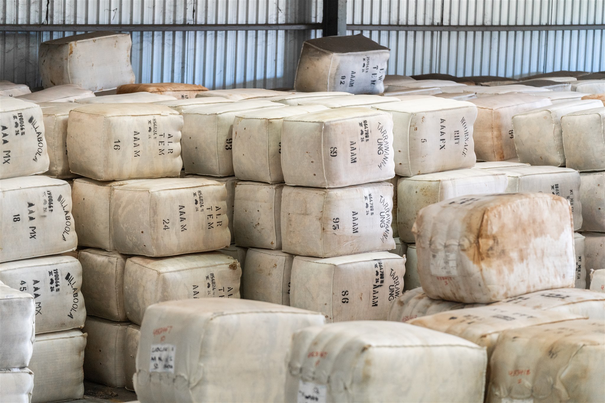 A stack of wool bales at Moses & Son Temora's Warehouse