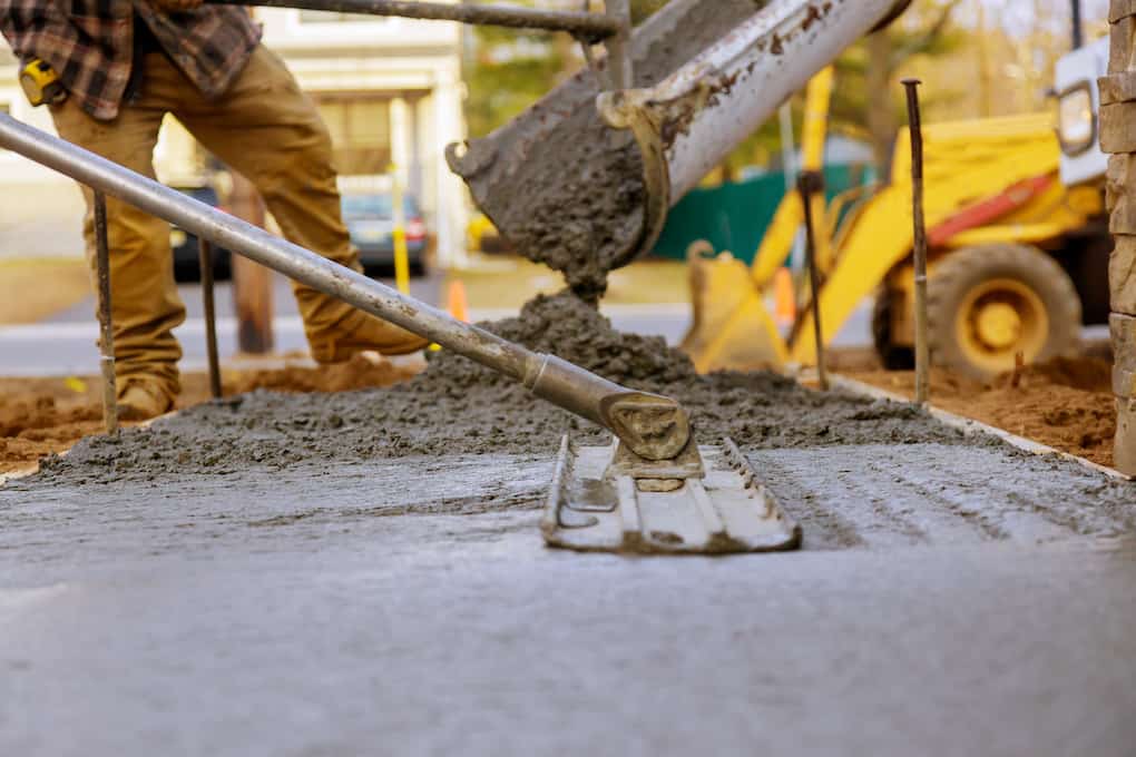 Desert Rock Concrete contractors pouring concrete driveway in Gilbert AZ