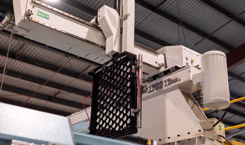 plastic injection moulding machine manufacturing a bread crate