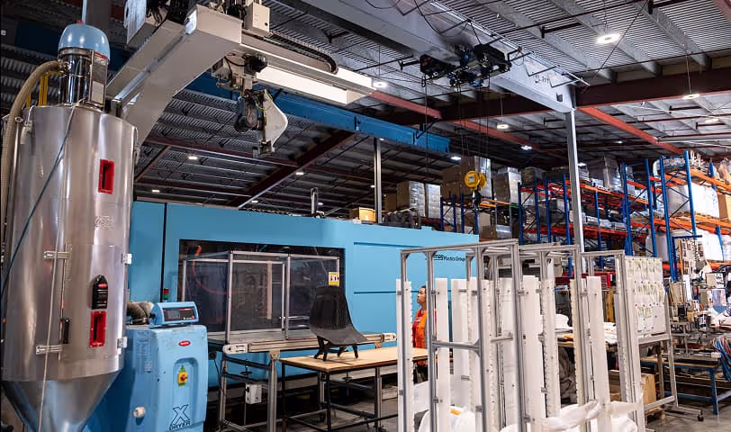 a range of plastic manufacturing machines in a plastic product design and development factory