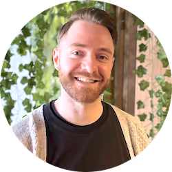 A close picture of a teacher's face.