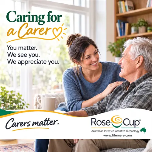 Healthcare professional discussing an adaptive drinking aid with a person and caregiver.