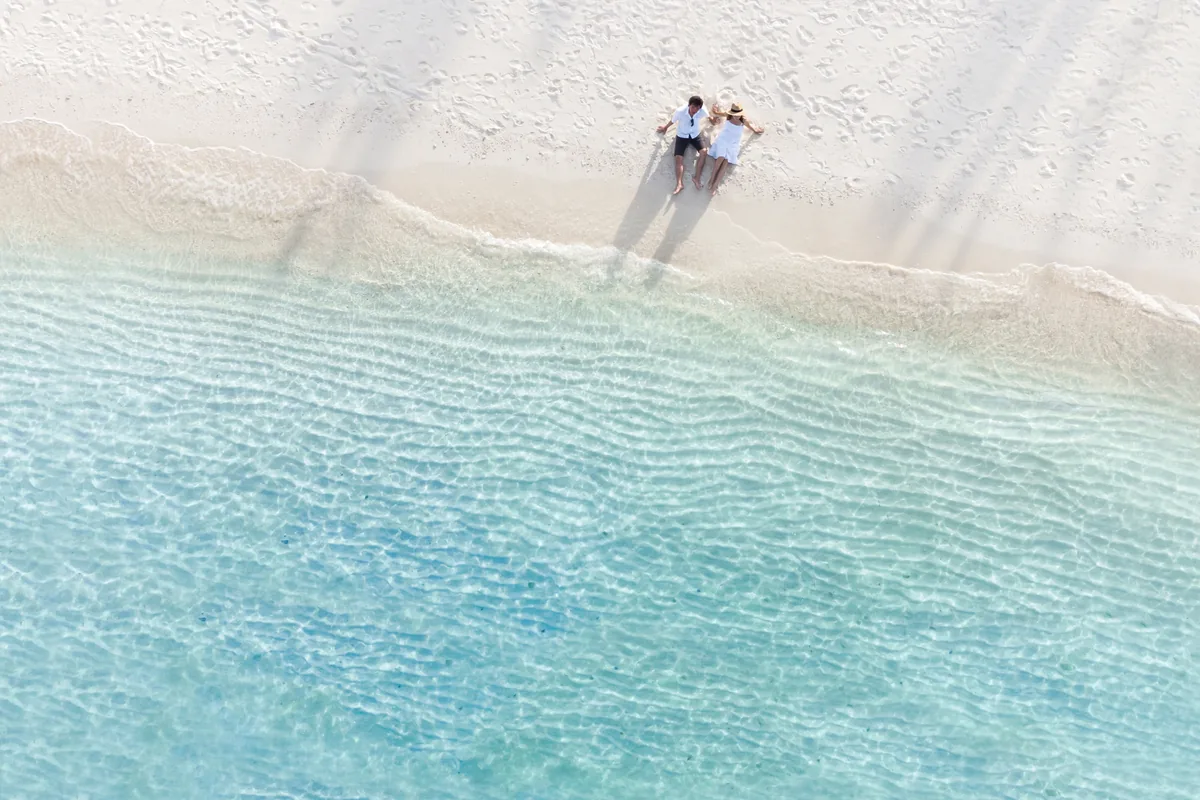 Aerial view of a person on the turquoise Gulf waters off St. Pete Beach