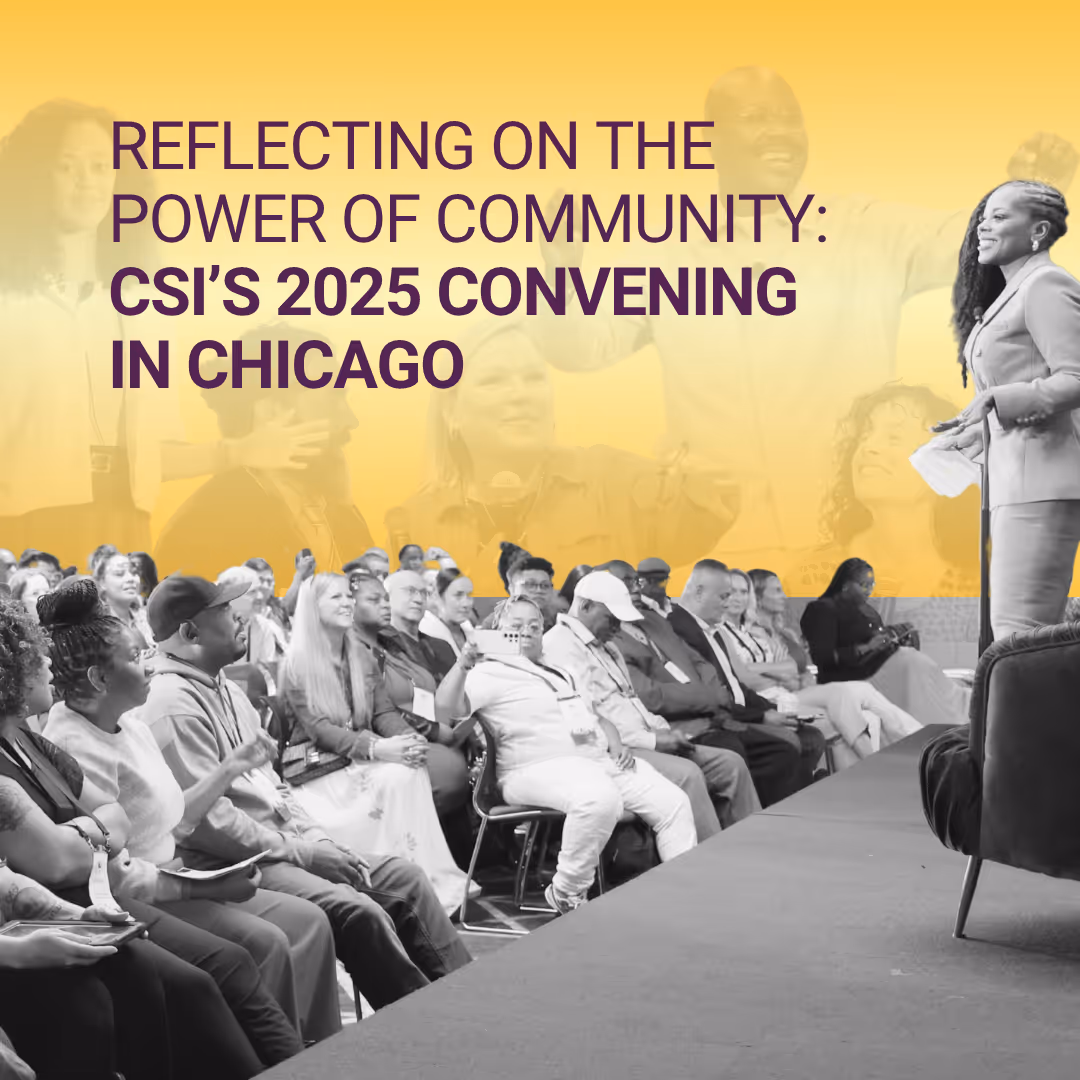 A woman giving a speech at a podium in front of a crowd.