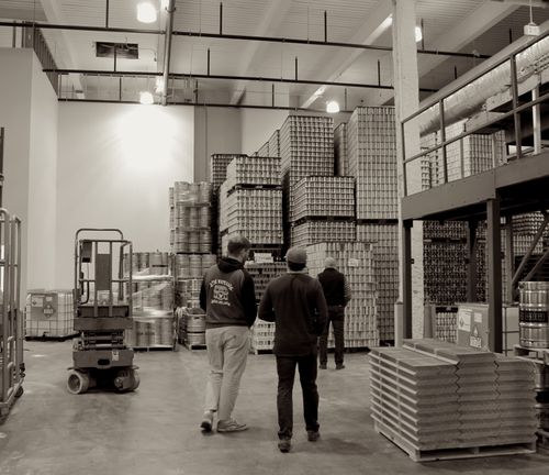 Two cocktails with garnishes