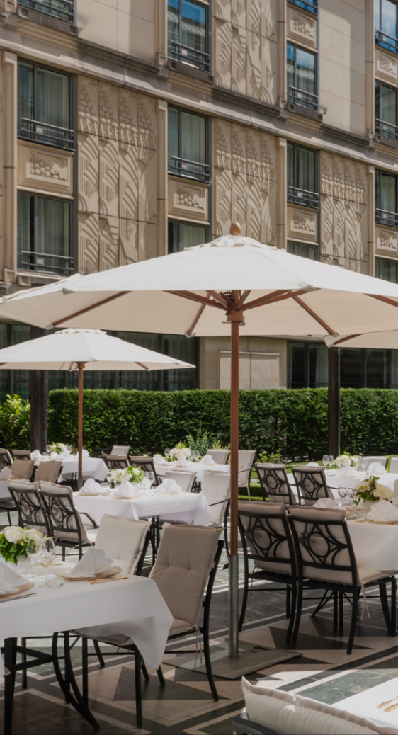 Table set in an elegant restaurant, perfect for a romantic dinner or a business meal.