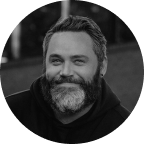 Headshot of man with beard