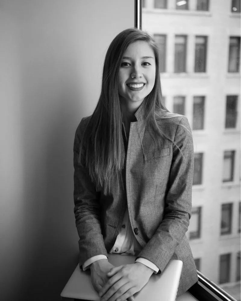 Headshot of women next to window