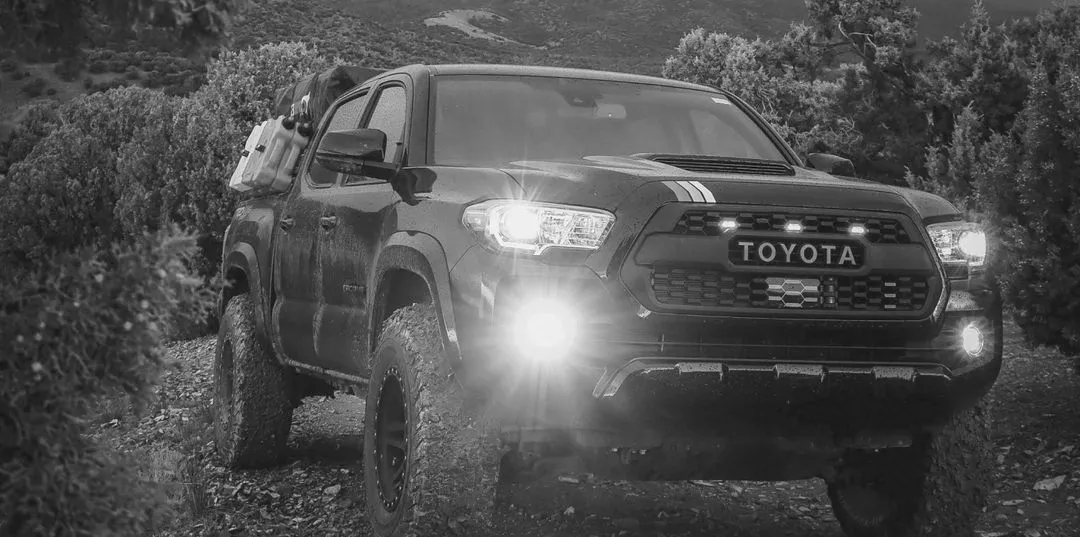 Black Toyota in mountains