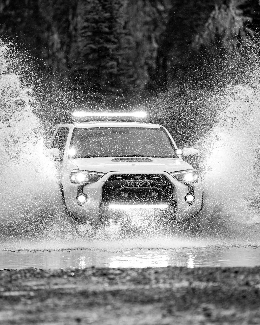 Toyota SUV splashing up water