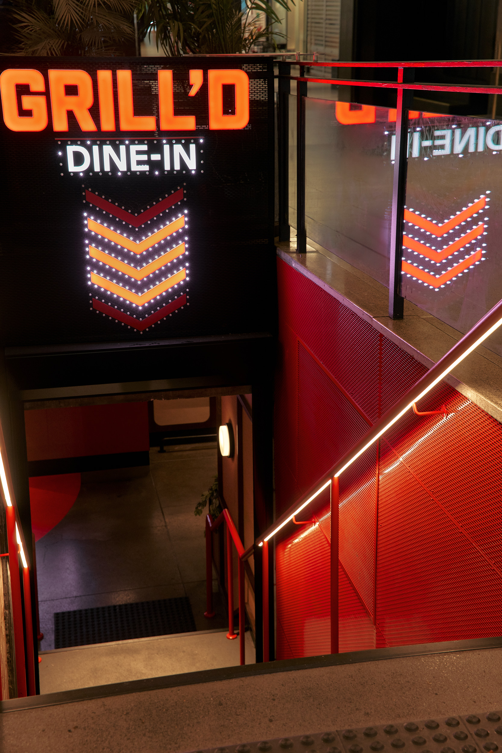 Dine-in Signage LED Railing Way Down to Grilld. Photo by Michael Gazzola, Jake Roden.