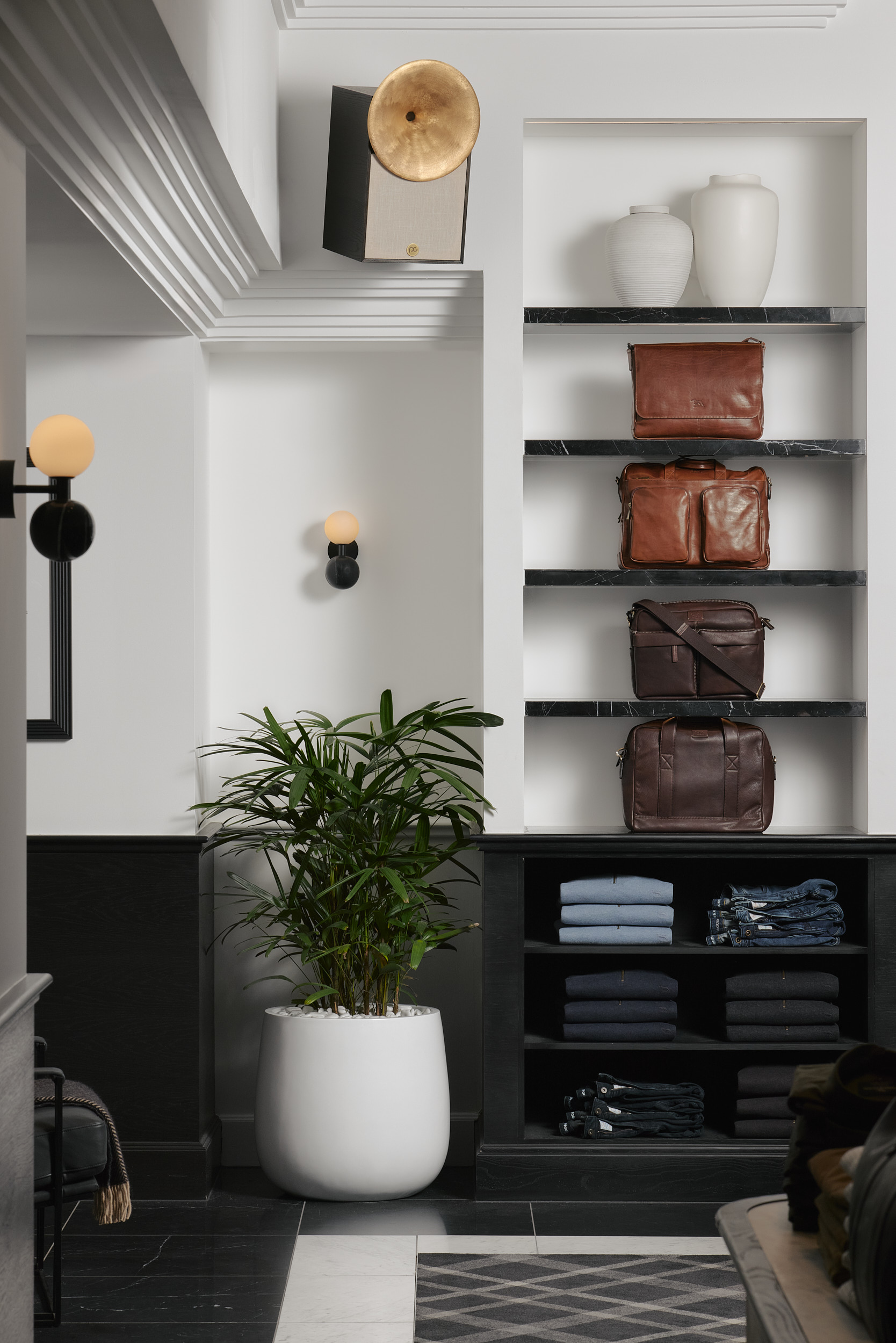 Hallway Bags vase planter shirts lights Rodd and Gunn in Melbourne. Photo by Jake Roden.