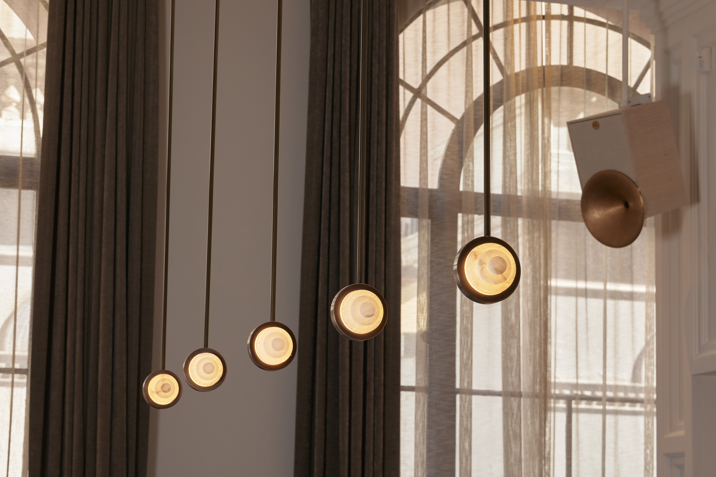 Pendant Lights Circle Curtain Speaker Rodd and Gunn in Melbourne. Photo by Jake Roden.