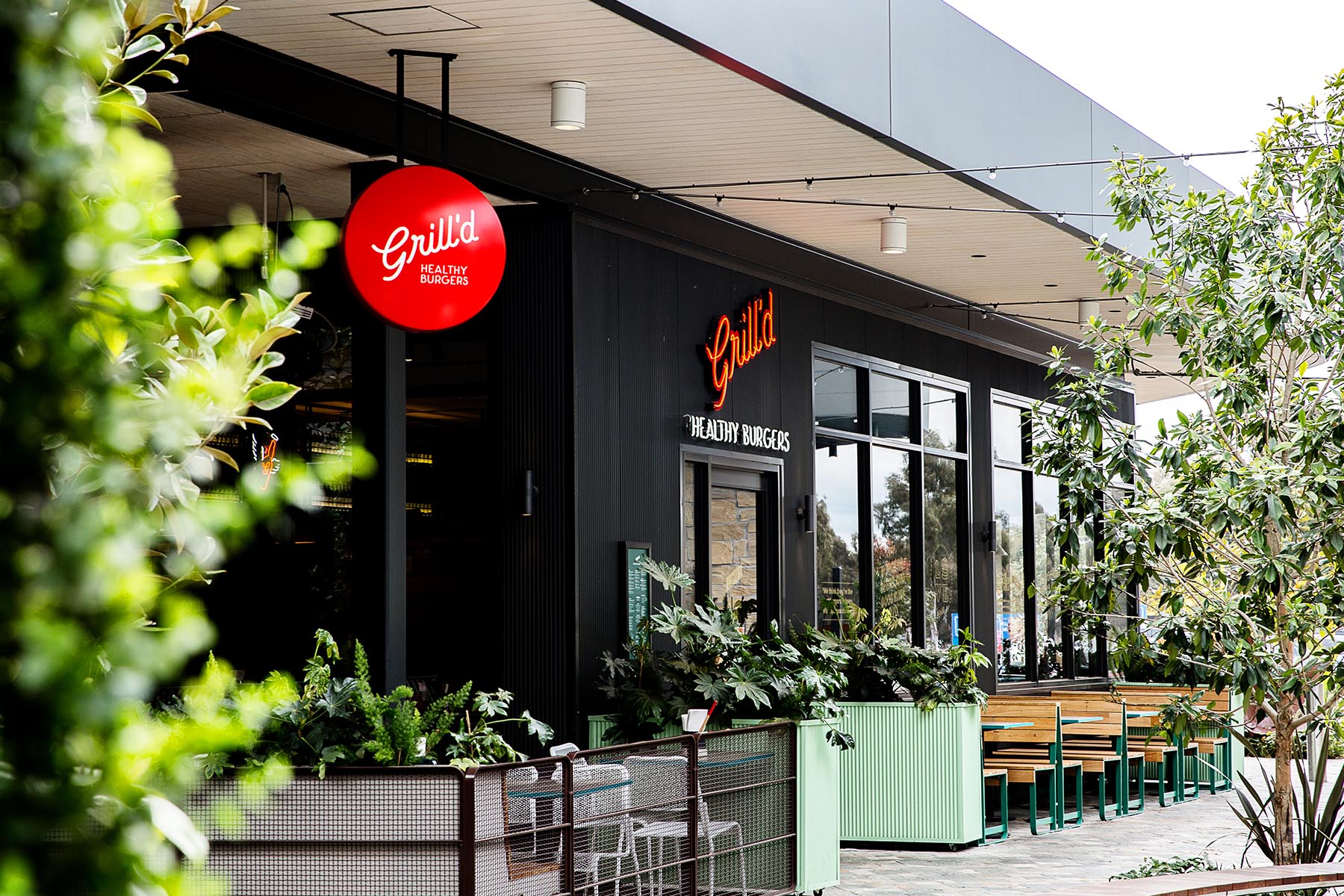 External Seating Signage Entry Window Black Framing in Grilld. Photo by Michael Gazzola, Jake Roden.