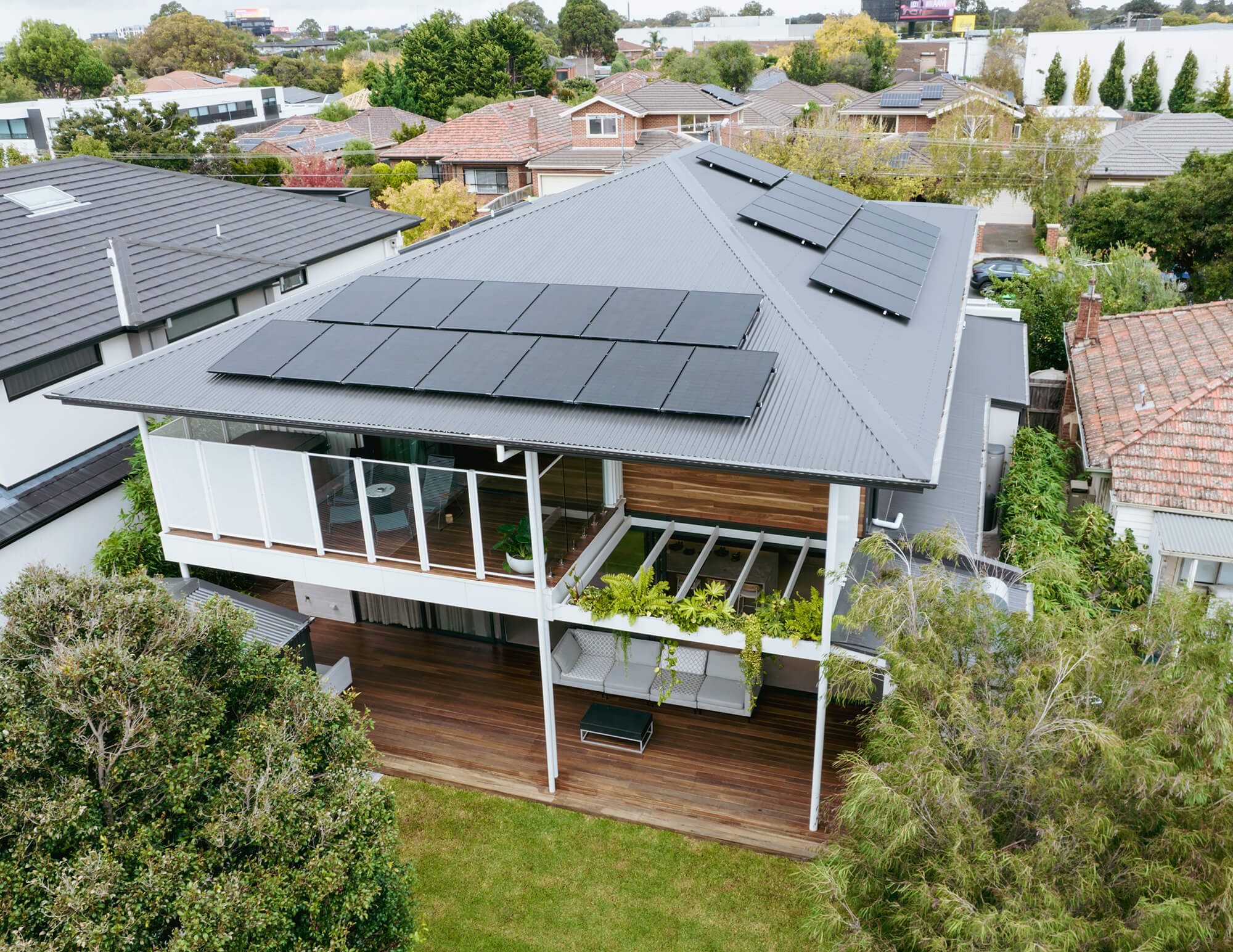Solar Panel Roof Greenery Growing on Joist Glazing on First Floor in MC House.