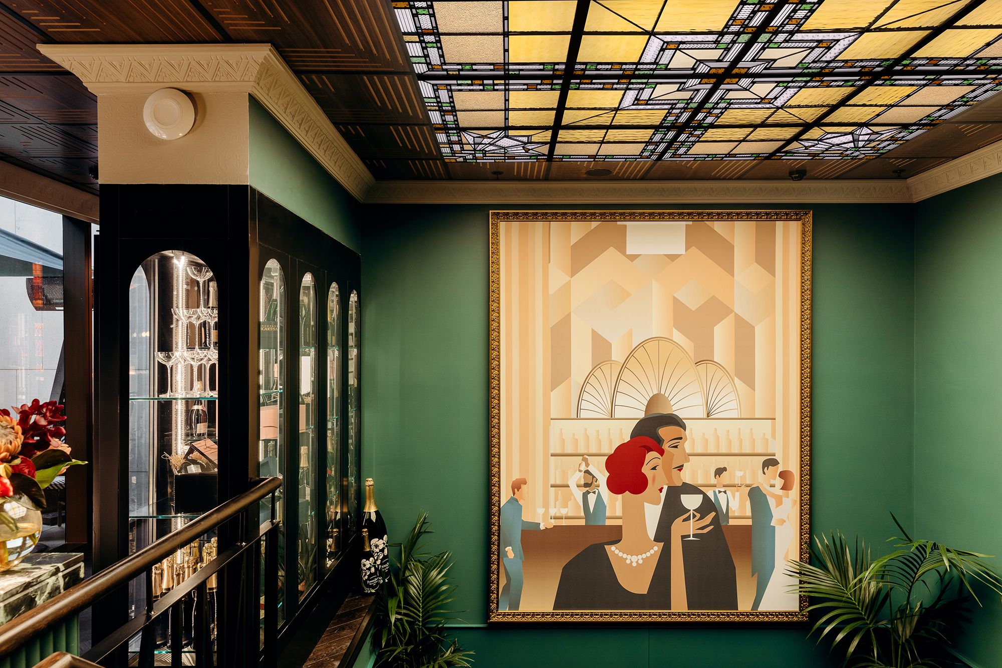 Large Art Deco Mural Stained Glass Ceiling Panel Green Walls Arched Glassware Display Ornate Plaster Cornice in Nick & Nora’s. Photo by Ryan Sauer.