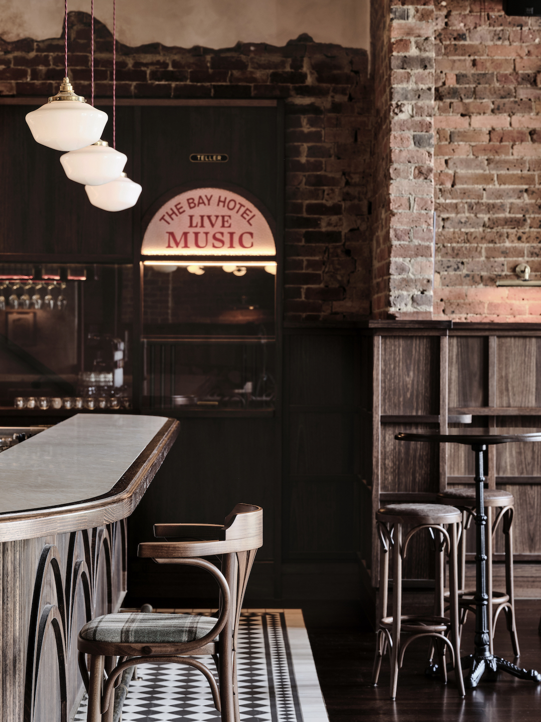 Arched Live Music Neon Signage Detail Timber Bar Profile Opal Pendant Lights Exposed Brickwork and Plaid Bar Stools in The Bay Hotel. Photo by James Geer.