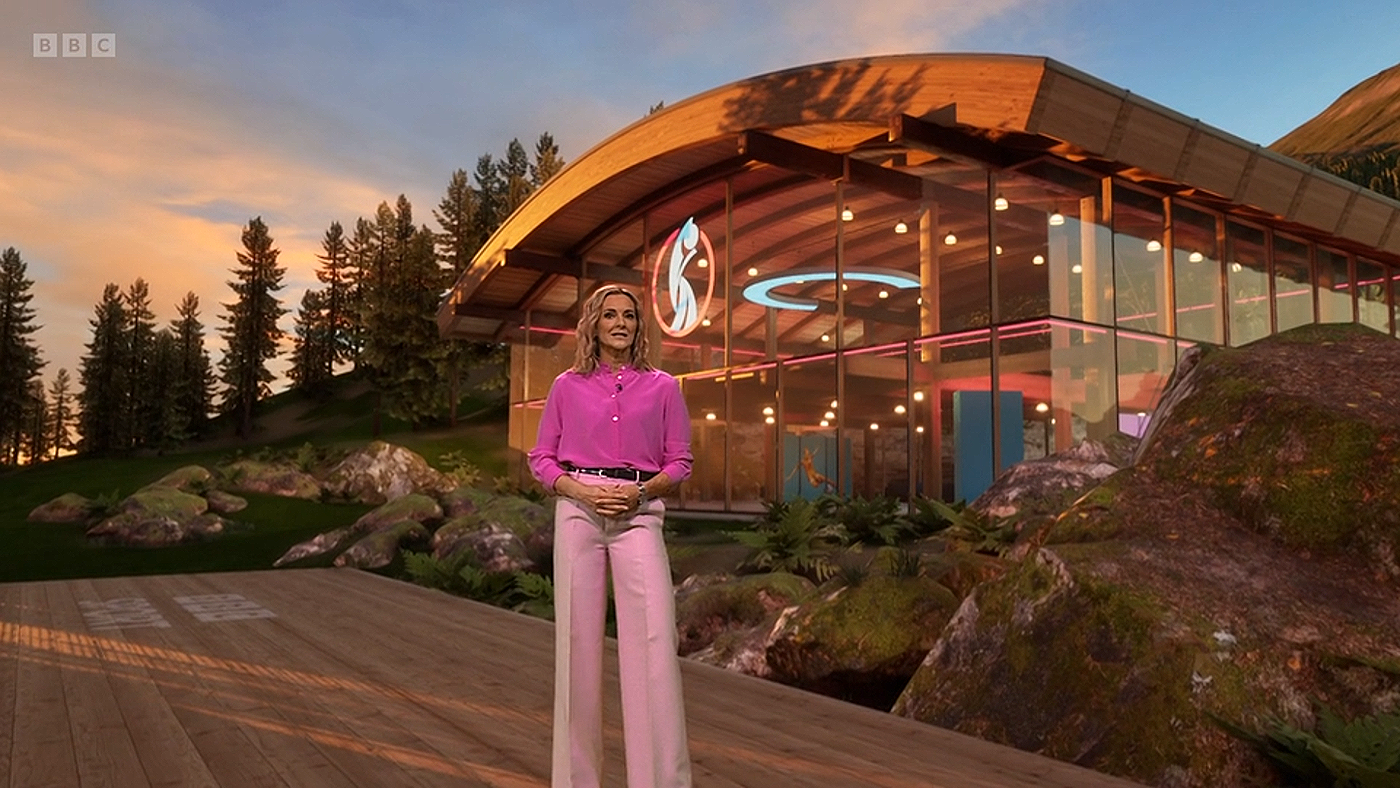 Gaby Logan presents from an exterior postion infront of the pavilion. In reality, she is only a few metres away from her seat, but because it's virtual, we can place her anywhere within the virtual world we have created.