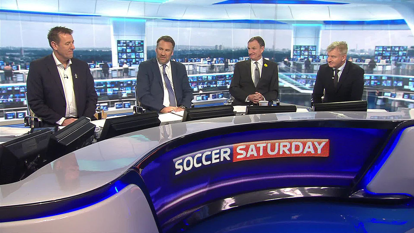 Four pundits - Matt Le Tissier, Paul Merson, Phil Thompson and Charlie Nicholas - sat before the Soccer Saturday digital backdrop designed by Lightwell