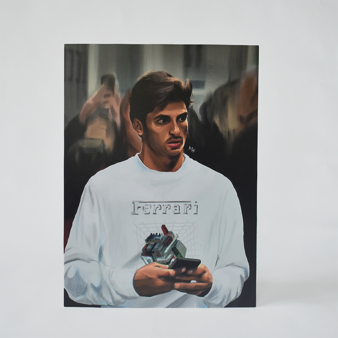 An art print of a digital illustration featuring Carlos Sainz wearing a Ferrari sweater.