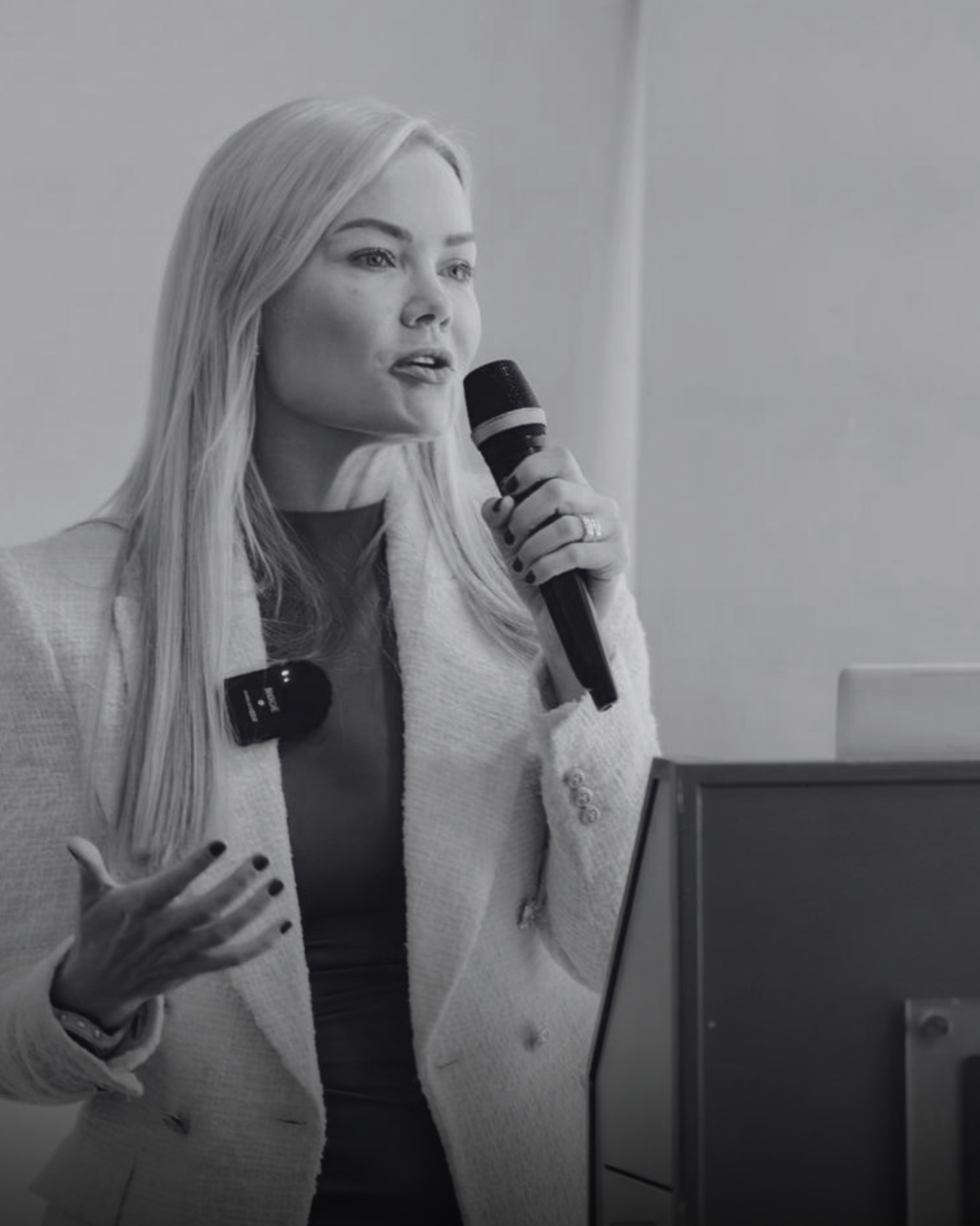 Charlotte Lloyd speaking at an event