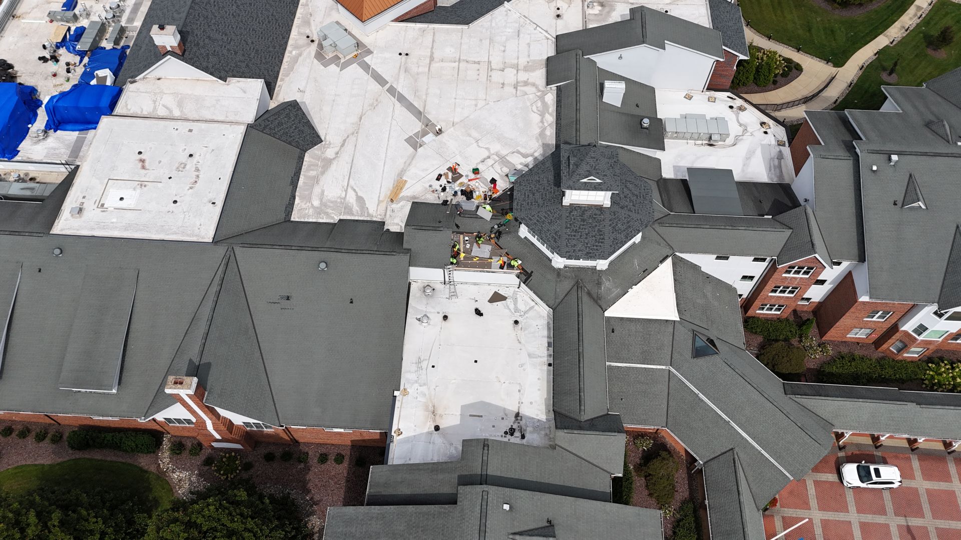 Man in helmet looking at building