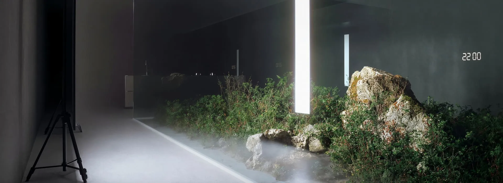 A futuristic interior visualization by one of the top 3D rendering companies, featuring a dark, high-tech space with a misty indoor garden, illuminated rock formations, and a glowing vertical light panel.