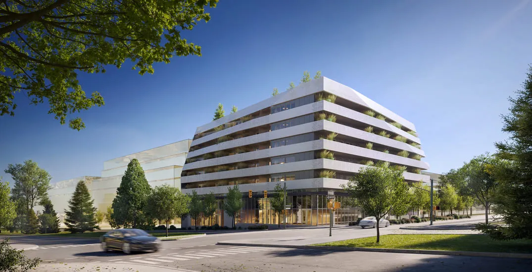 A mixed-use development featuring a blend of commercial and residential spaces. The building has a striking, contemporary design with large balconies and rooftop greenery, integrating urban living with sustainable design practices, showcased in this 3D rendering of Vancouver.