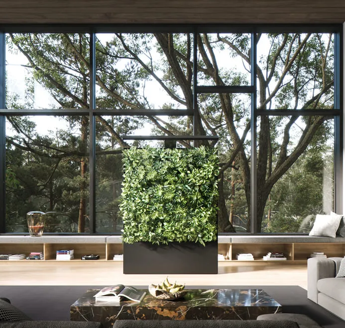 3D rendering of a cozy room in Chicago with a lush green living wall, large windows overlooking a forest, and a stylish seating area.