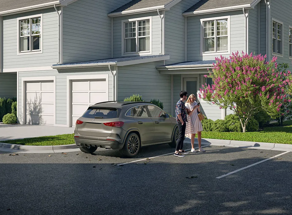 3D car rendering of an SUV parked in front of a suburban home, with two people standing nearby, looking at a smartphone.
