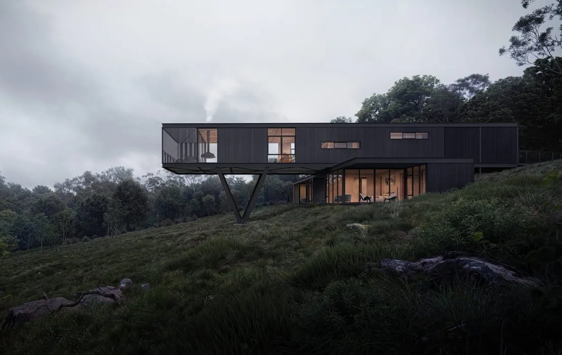 Architectural visualization Perth: Misty morning view of an elevated modern house with a black exterior, partially cantilevered over a grassy slope. The residence integrates clean lines and expansive glass, blending with the surrounding forested landscape.