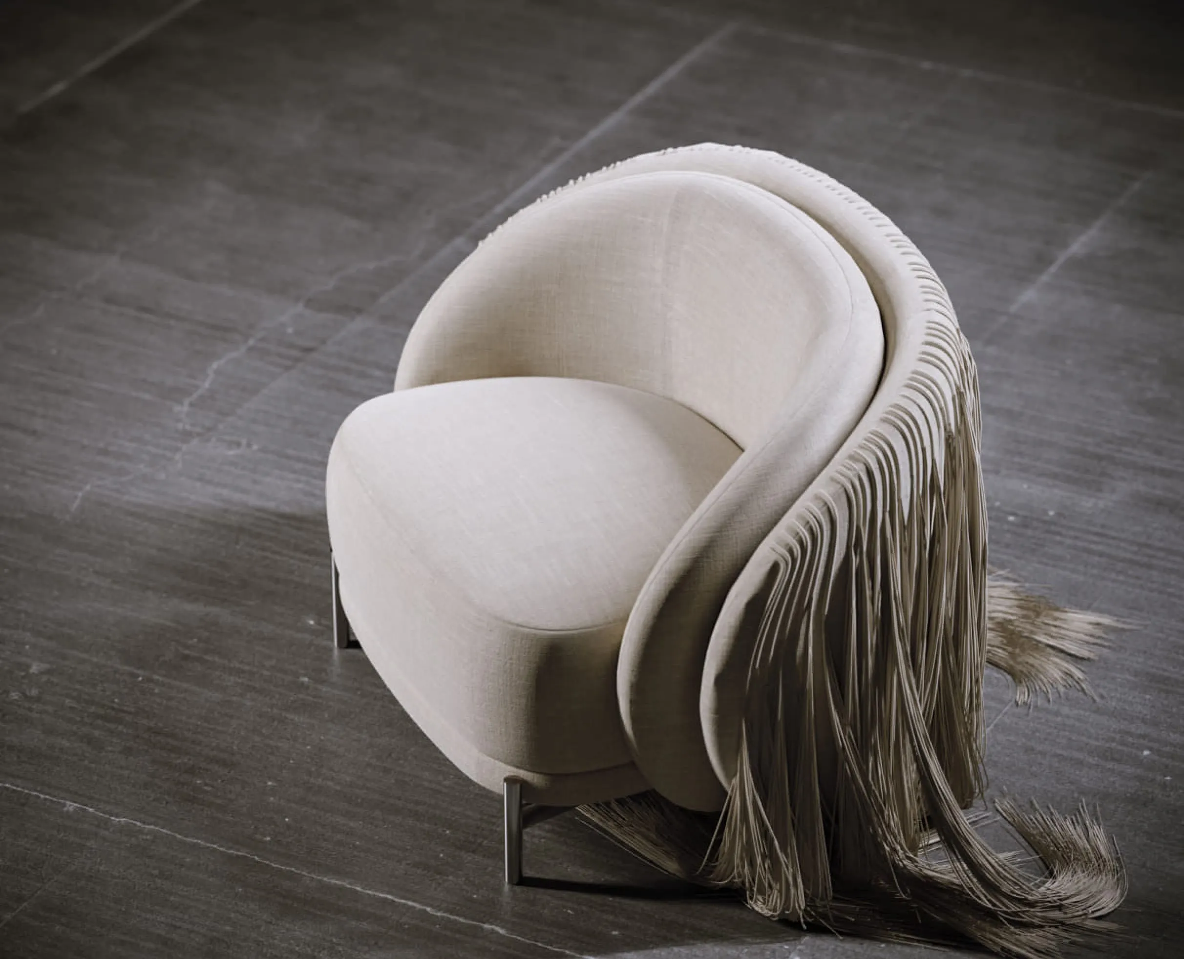 A beige version of the same designer chair with fringes, placed on a textured floor — rendered using Product 3D Modeling Services to display realistic material and lighting.