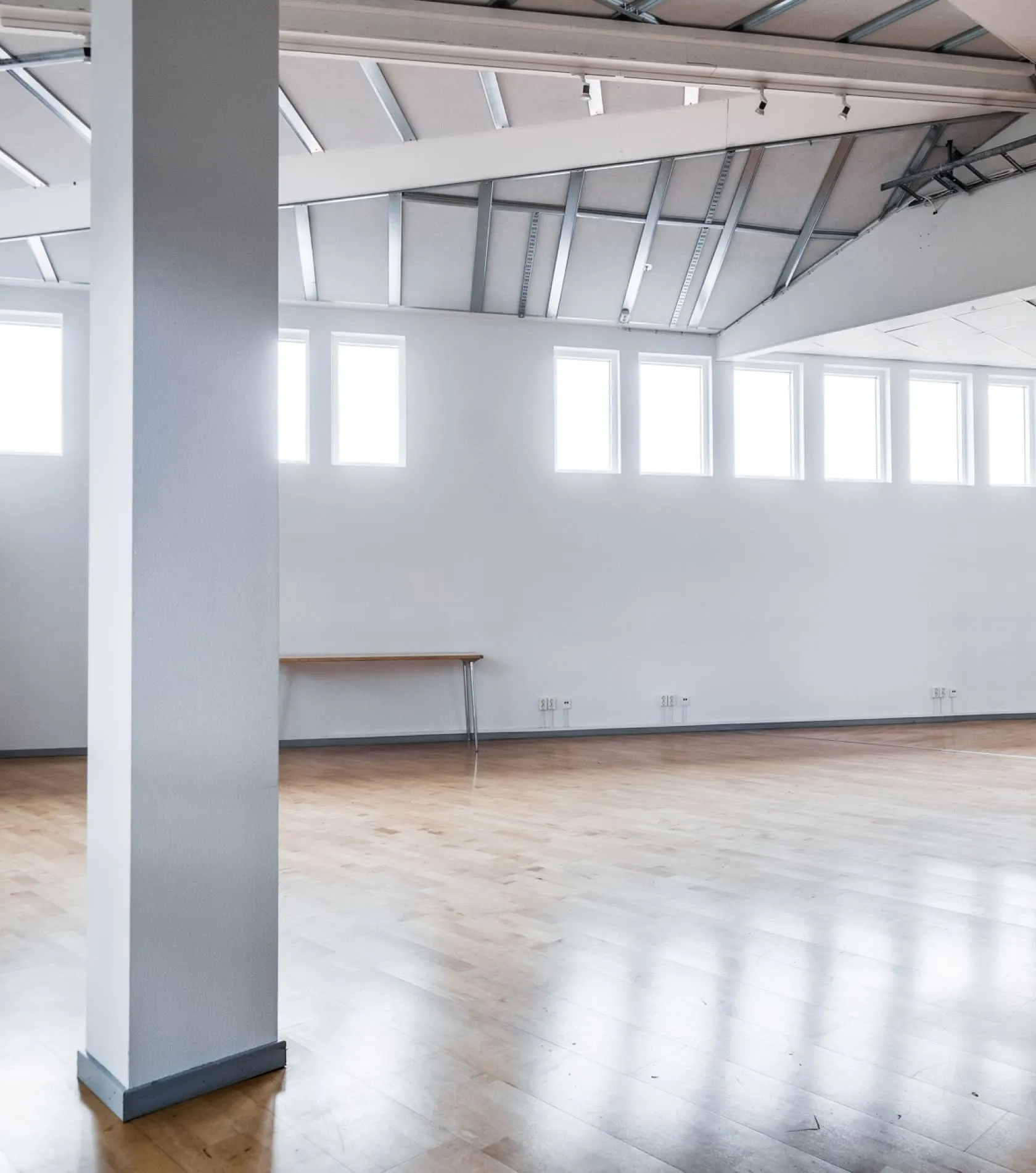 Virtual staging for real estate photos – the example of initial data. Office premises with naked and plain floors and walls.