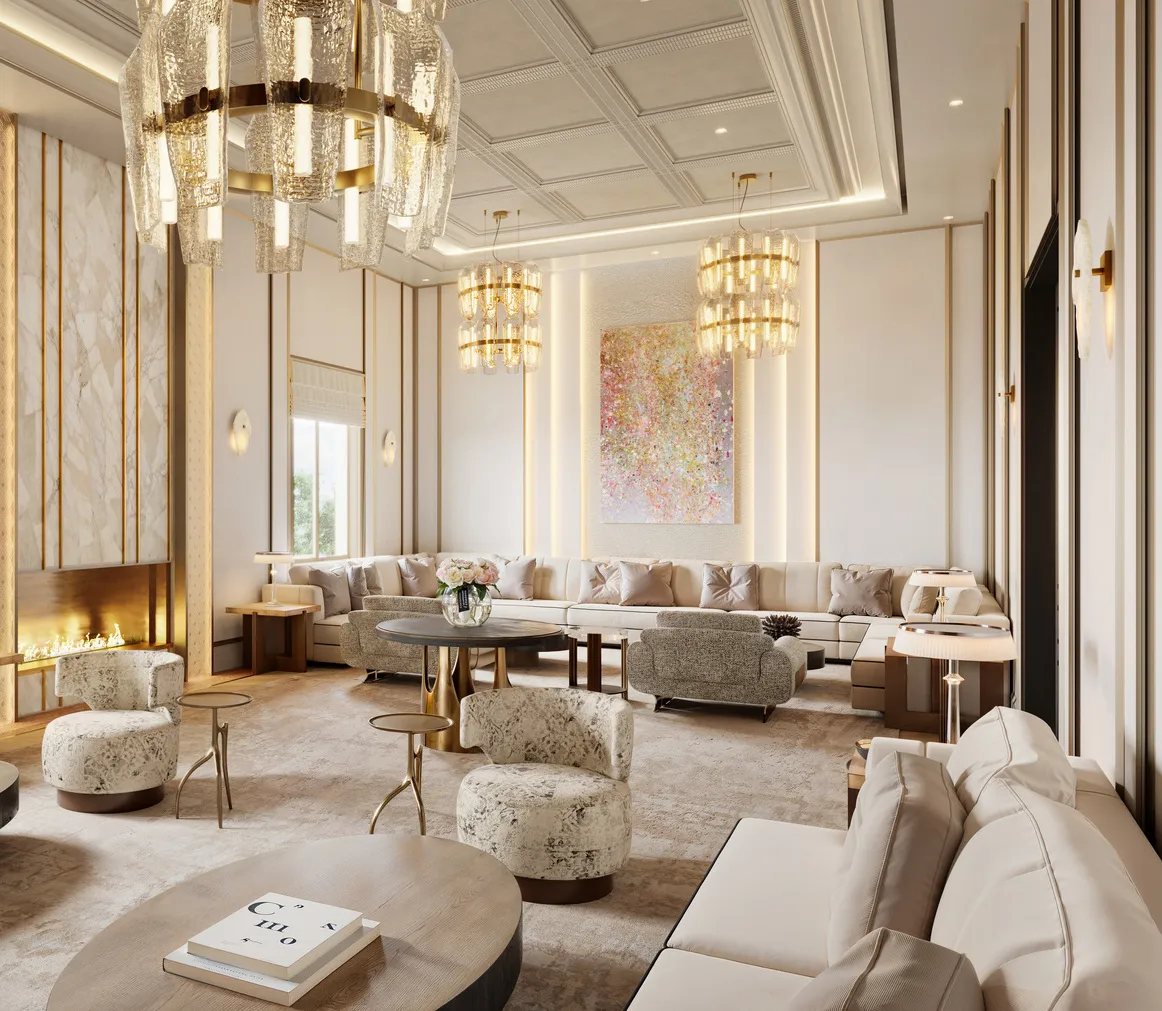 Sophisticated lounge with coffered ceiling, gold-trimmed crystal chandeliers, plush cream sofas arranged in a U-shape, and marble accents surrounding a modern fireplace.