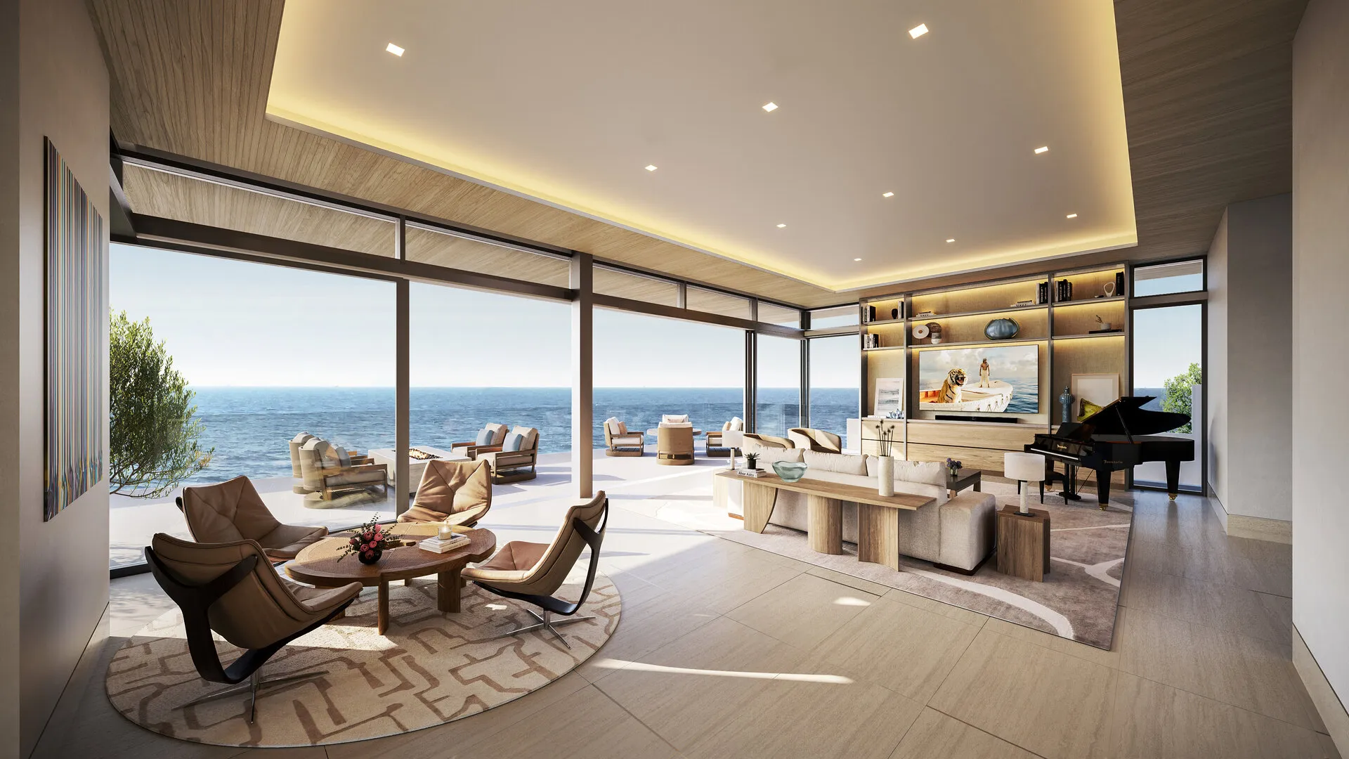 Oceanfront living space with panoramic sea views, modern furniture, and a grand piano, designed by Landry Design Group.