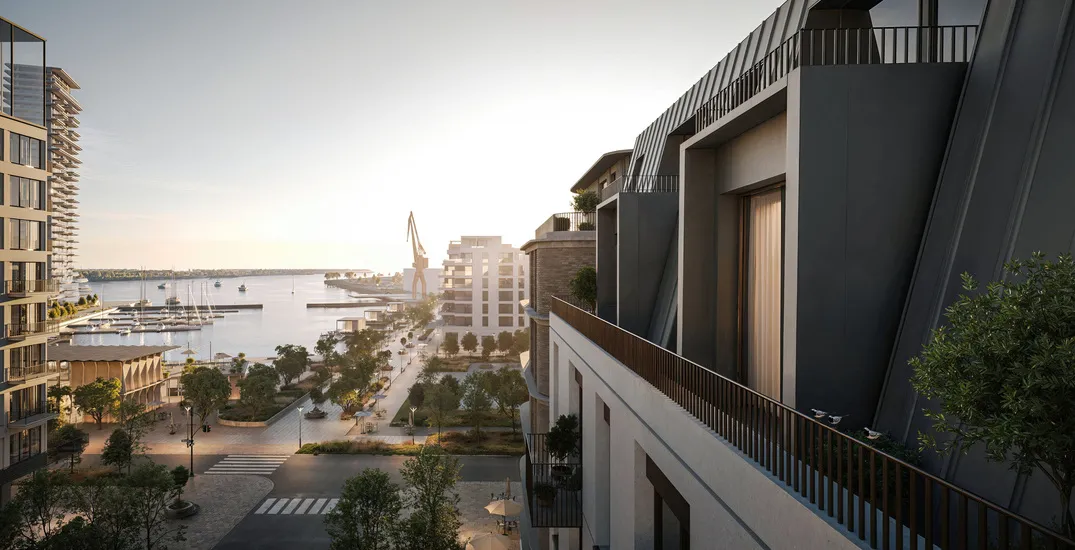 Sleek modern apartment buildings along a marina promenade with pedestrian-friendly streets – luxury waterfront design in a construction project portfolio.