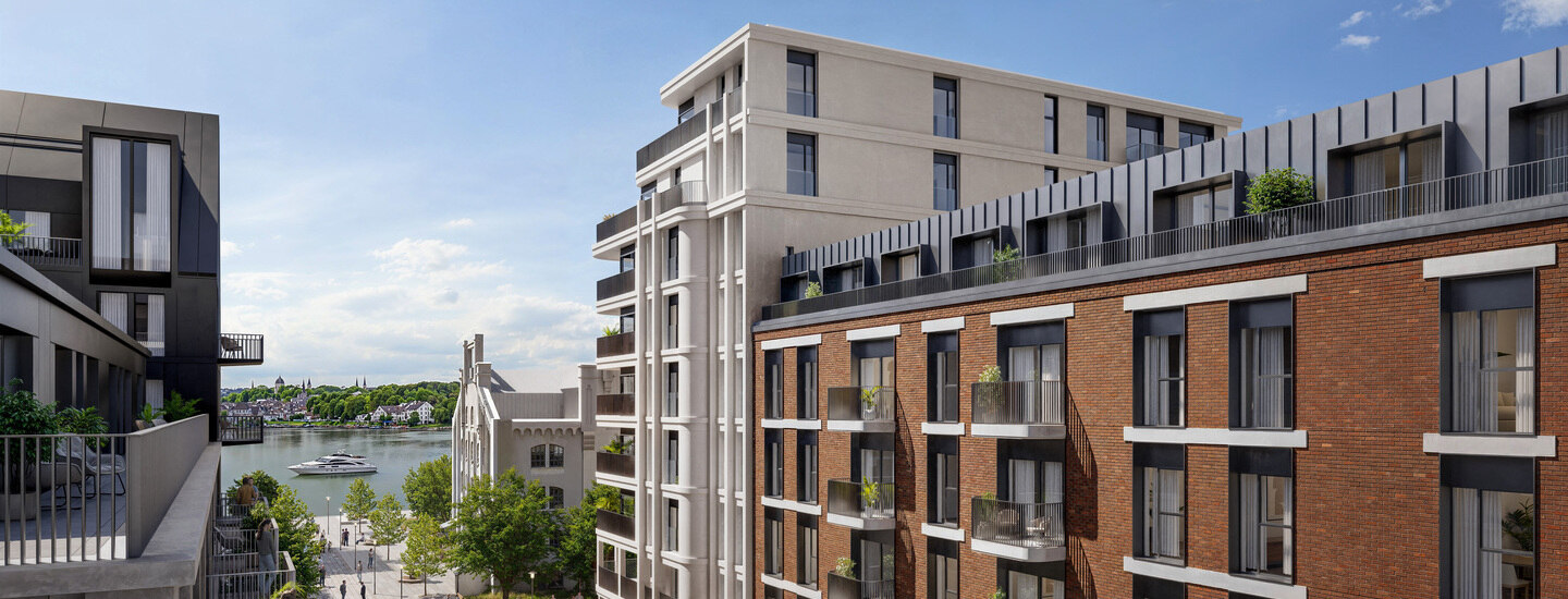 Waterfront residential buildings with modern brick-and-glass facades, balconies, and marina views – architectural showcase in a construction project portfolio.