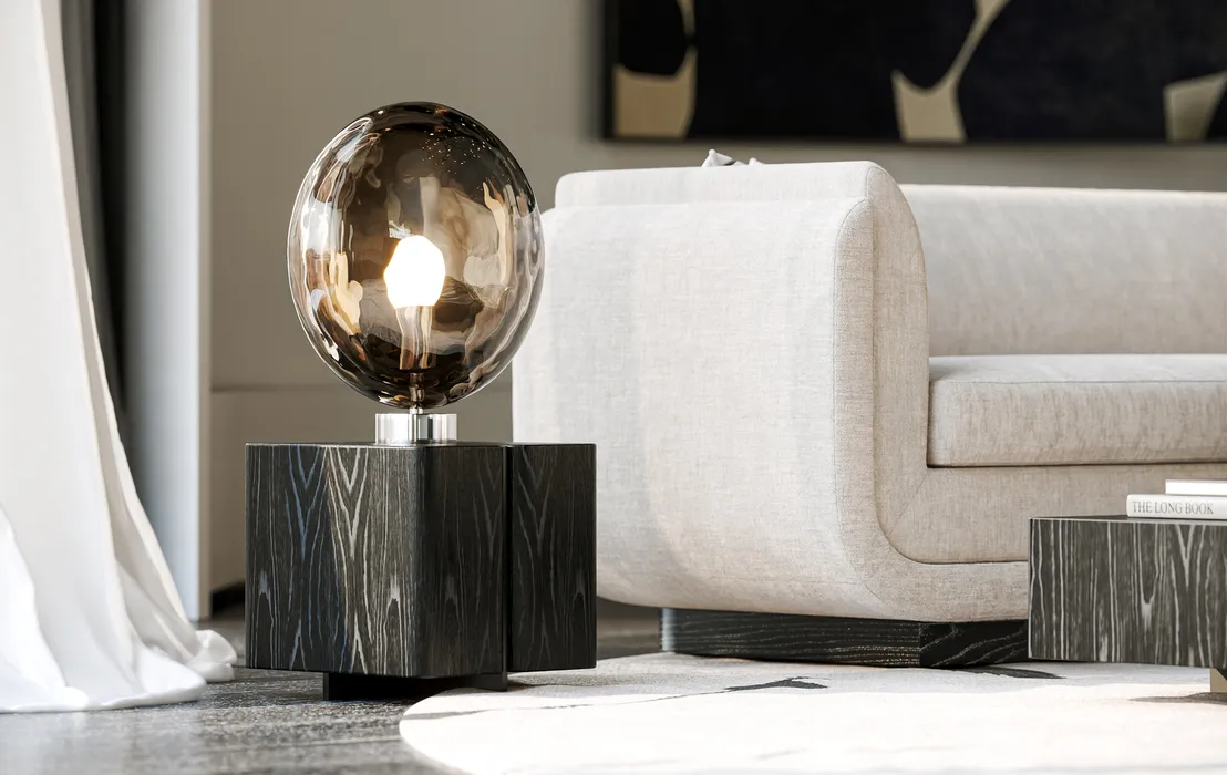 Close-up of modern glass globe lamp beside sofa – 3d rendering vs photography in detailed interior product visualization.