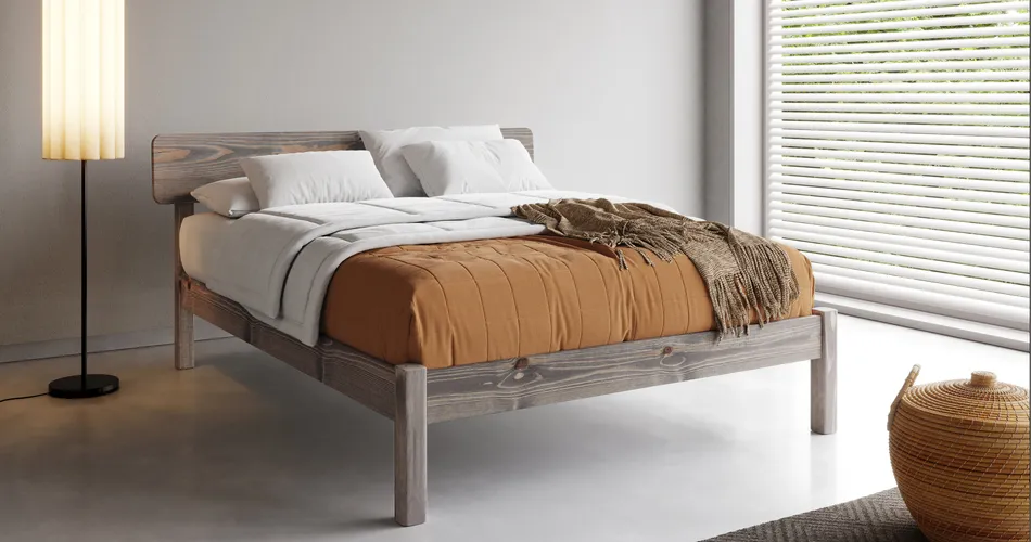 Minimalist bedroom with wooden bed frame, warm bedding, and floor lamp – 3d rendering photography highlighting cozy modern interiors.