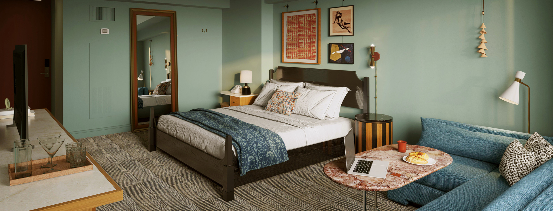Staging a bedroom with a mid-century modern aesthetic featuring a wooden bed, patterned bedding, teal sofa, marble coffee table, and curated wall art in a warm, inviting hotel-style layout.