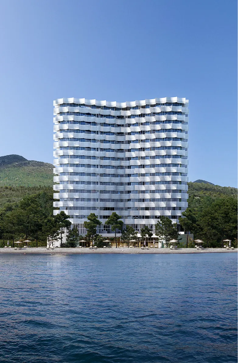 High-rise beachfront building with a wavy glass façade against a clear blue sky, created through professional 3D exterior rendering services.