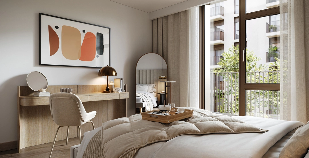 Stylish bedroom with minimalist décor and balcony access, highlighting premium interiors that support building a real estate portfolio in upscale properties.