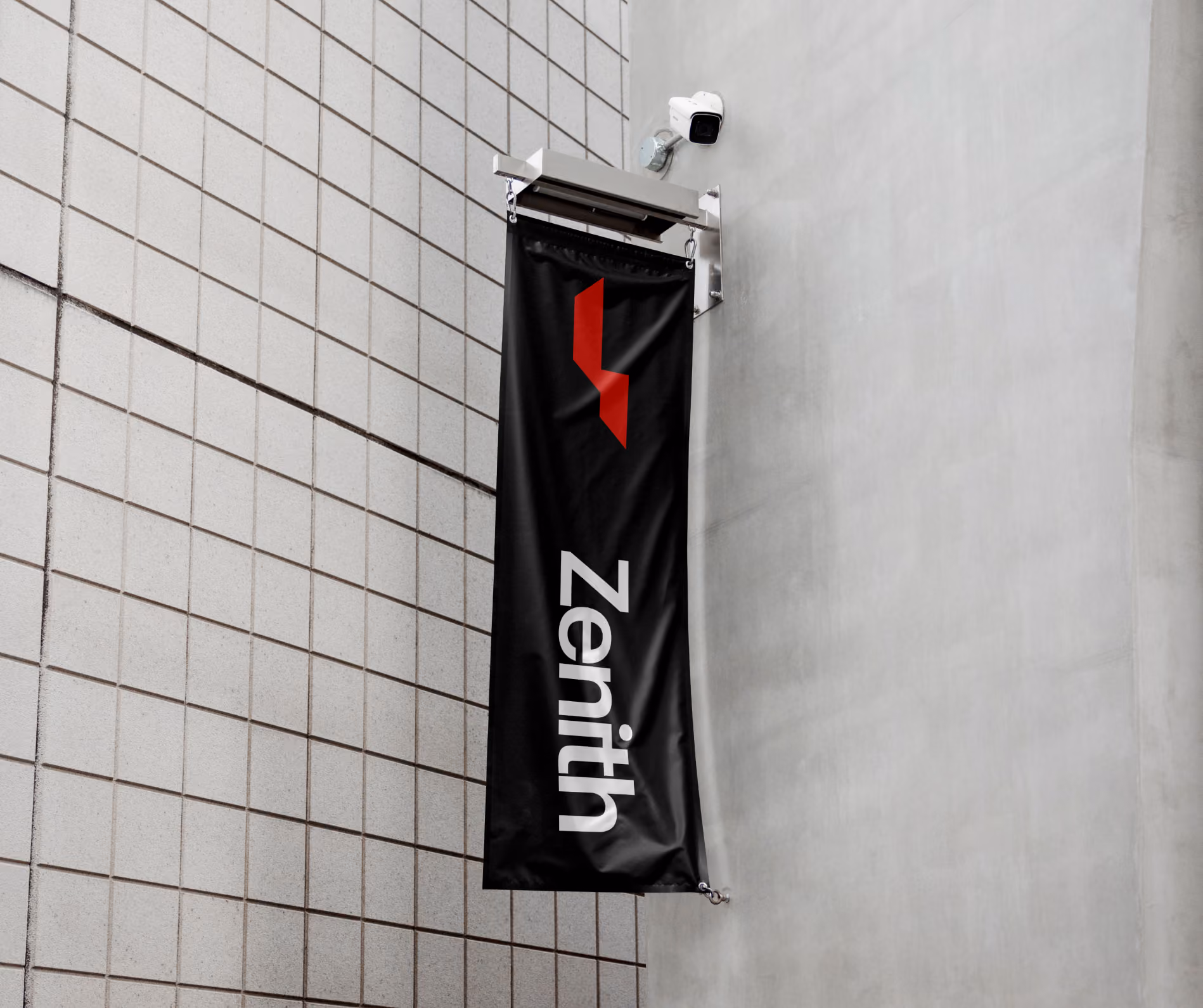 Black vertical banner with a red geometric logo and white text reading Zenith on a building wall.