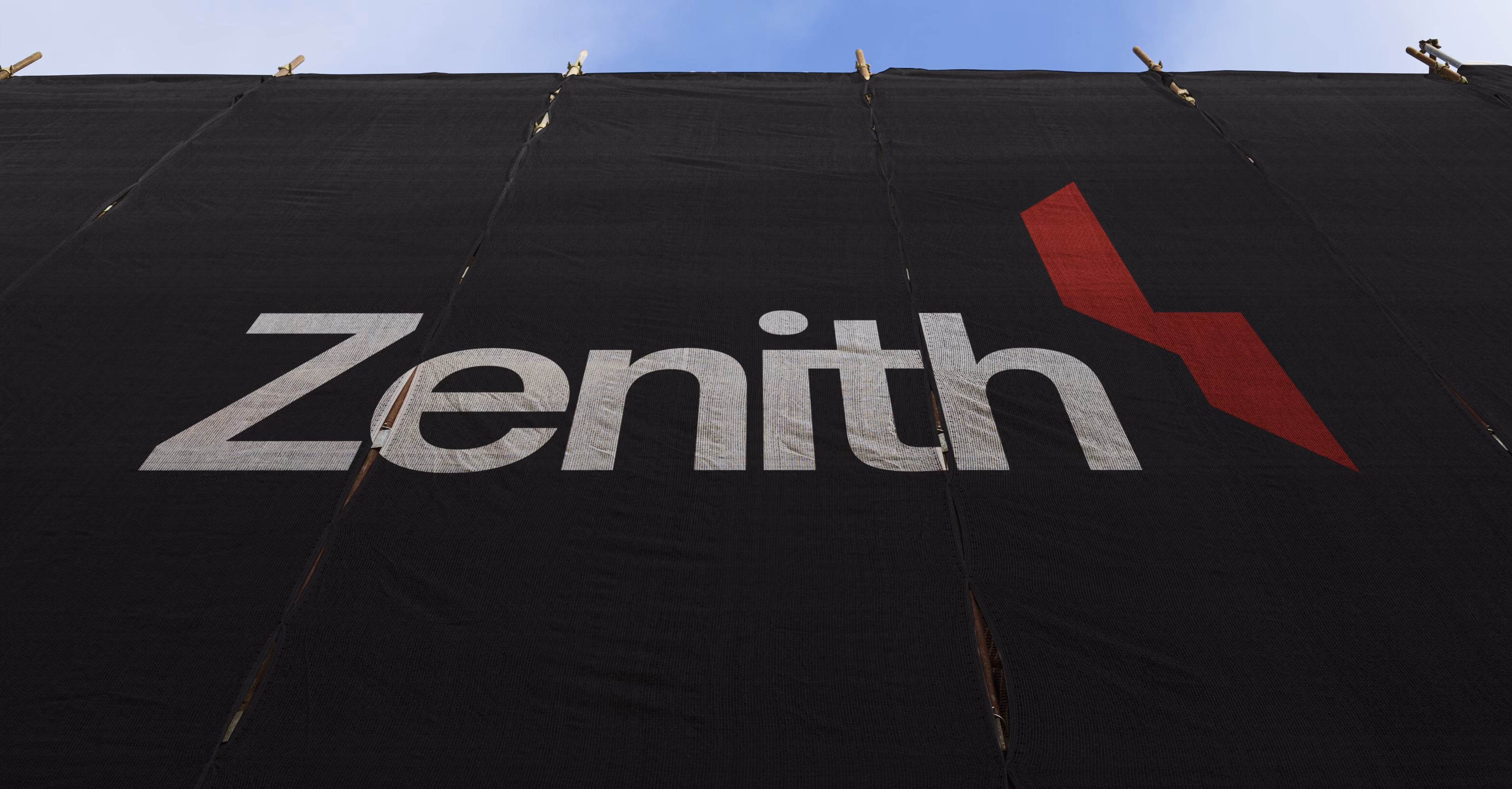Large black banner with the word 'Zenith' in white and a red geometric shape above the letter h.