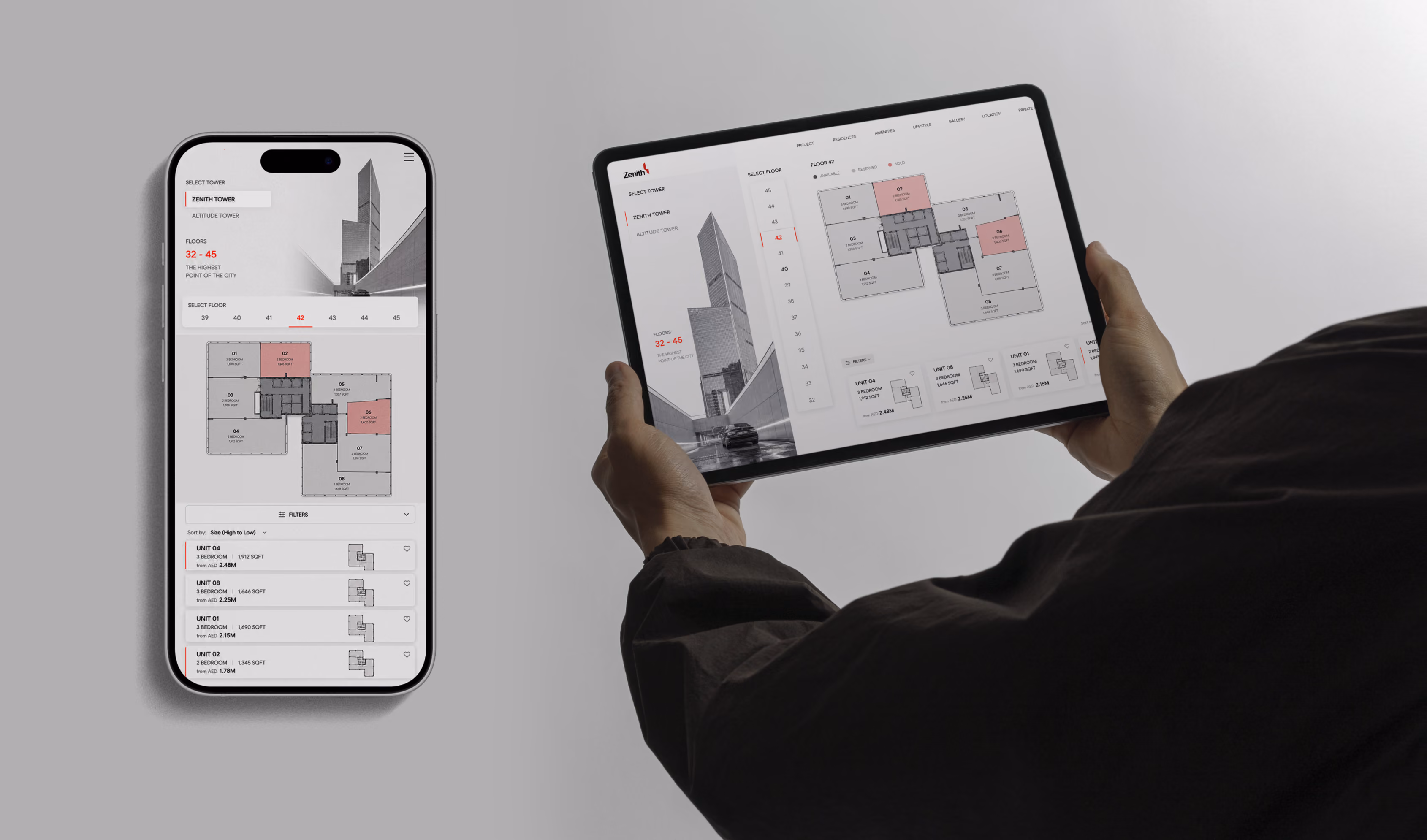 Desktop and tablet showing apartment floor plans and details for Zenith Tower units on a stone table.