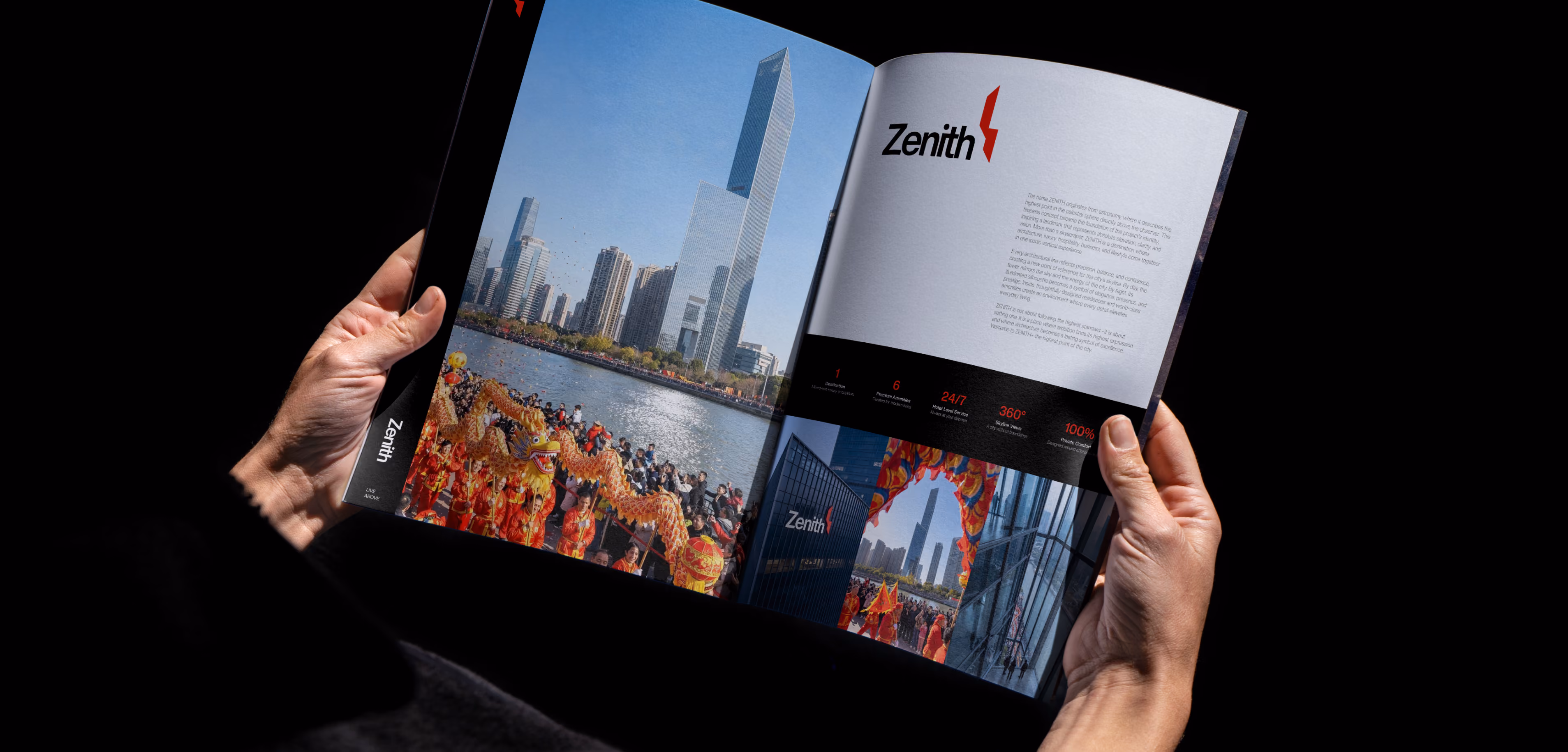 Open brochure showing a tall skyscraper with fireworks and detailed building facts and photos inside.