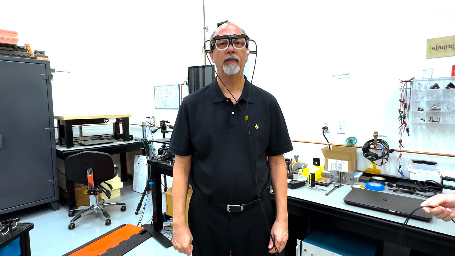 A Magic Leap engineer wears a head-mounted measurement device to test AR devices in motion.