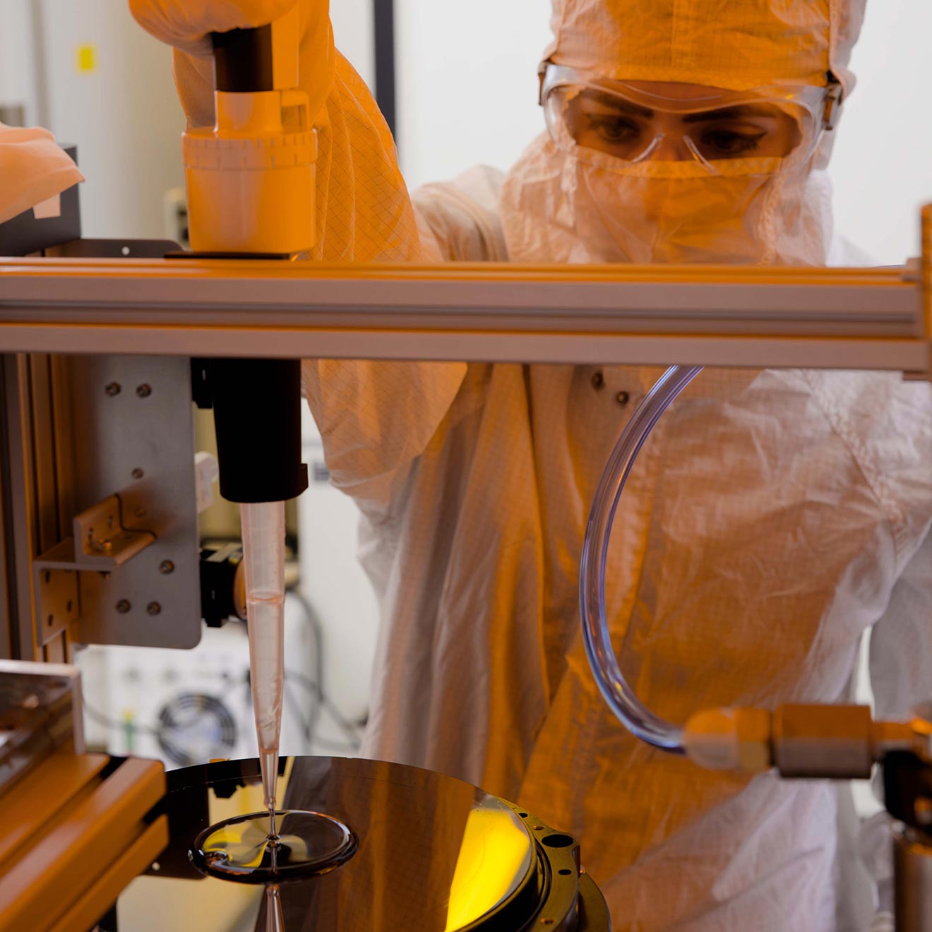 A Magic Leap technician applies a proprietary coating to a waveguide wafer.