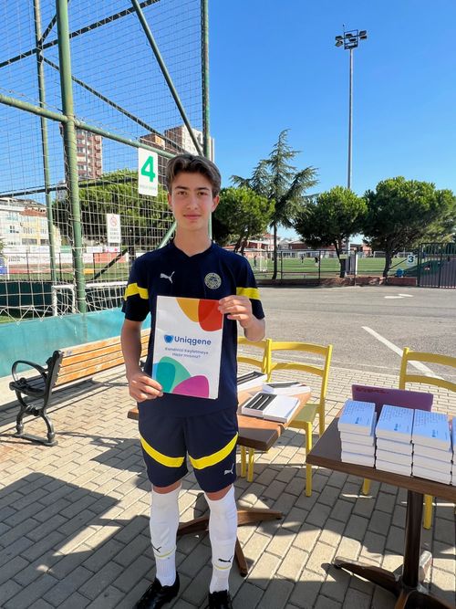 Team celebrating by joining hands