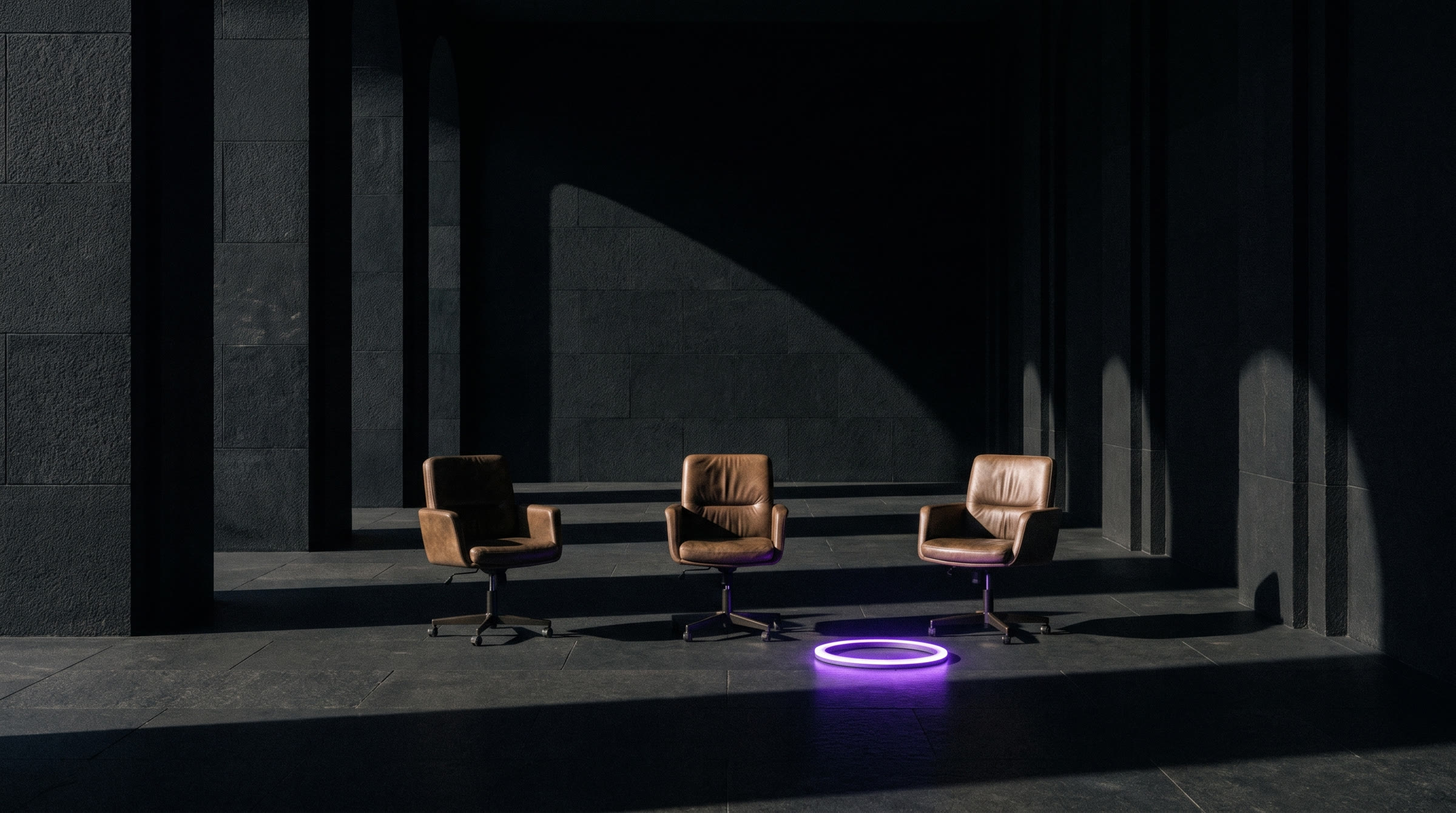 Three empty chairs, unused purple ring on the floor